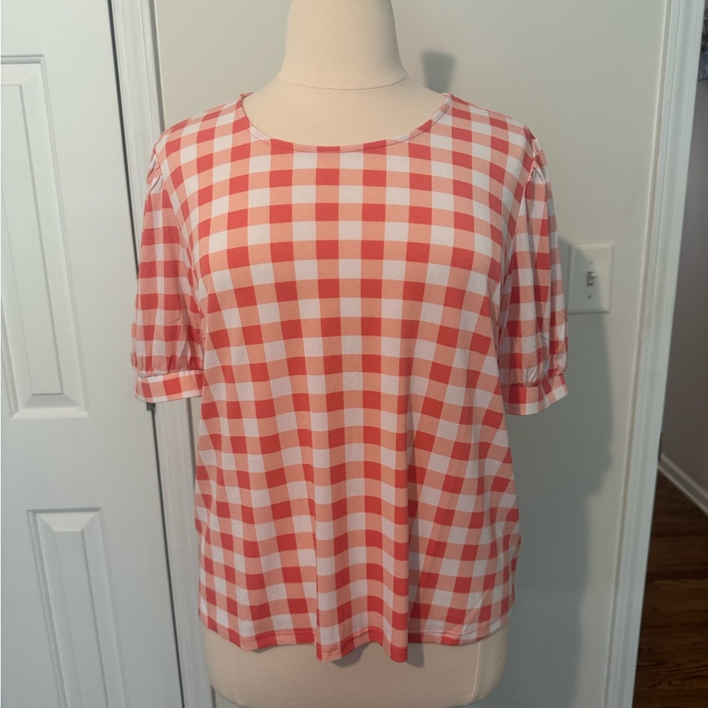 Cato top. Size XL. Orange/white checked. Polyester/spandex blend.
